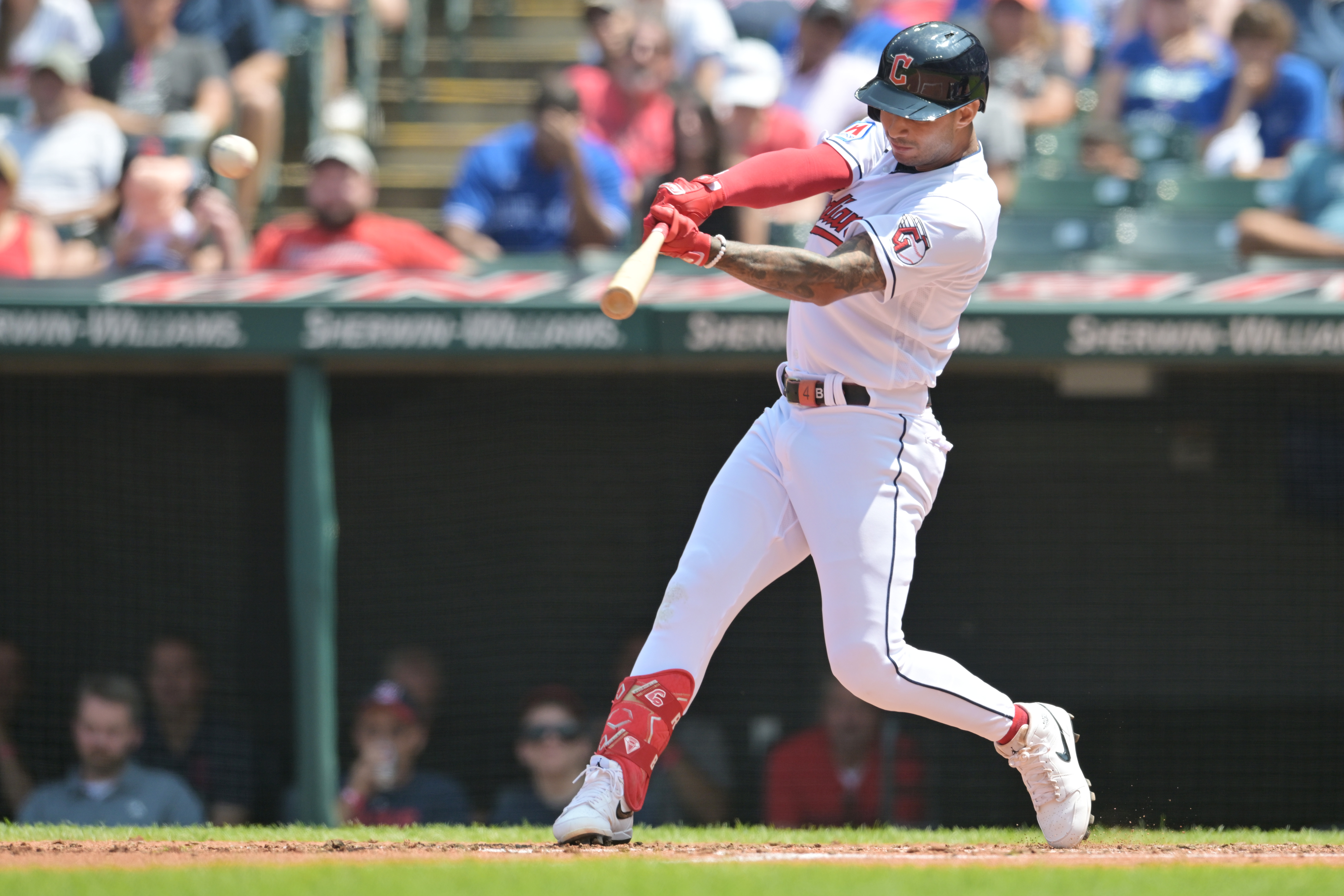 Aug 10, 2023; Cleveland, Ohio, USA; Cleveland Guardians third baseman Brayan Rocchio (6) hits an RBI double during the second inning against the Toronto Blue Jays at Progressive Field.